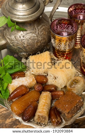 Traditional dates and cookies on a Moroccan tea tray