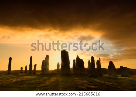 Megalithic stone circle of 3000 bc on the Isle of Lewis and Harris, Outer Hebrides, Scotland, silhouette at sunset
