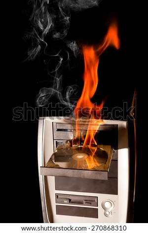 Burning computer and dvd drive on fire - all brand names removed