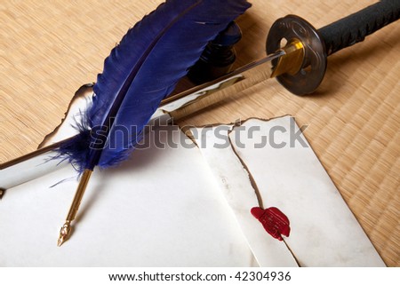 Vintage quill with japanese sword and parchment letter
