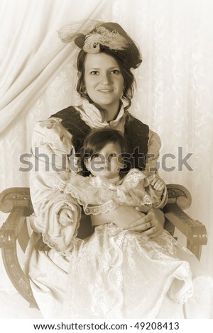 Vintage Victorian portrait of a happy mother with 4 months old baby
