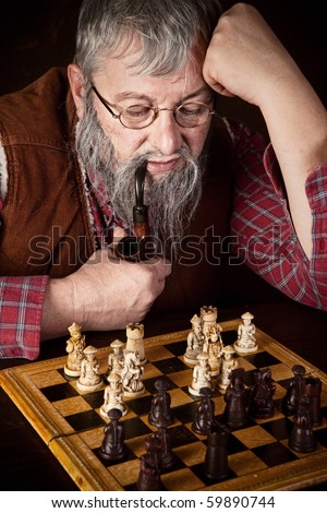 Vintage scene of an old man thinking about his next move in a chess game