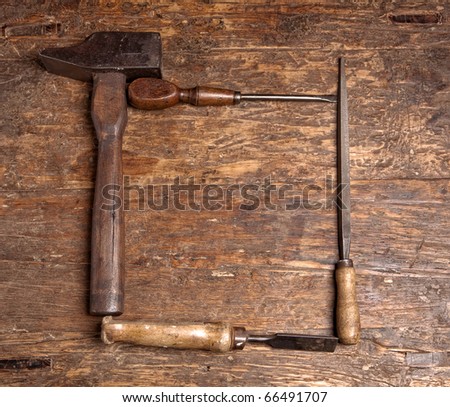 Border frame of rustic grunge carpenter tools