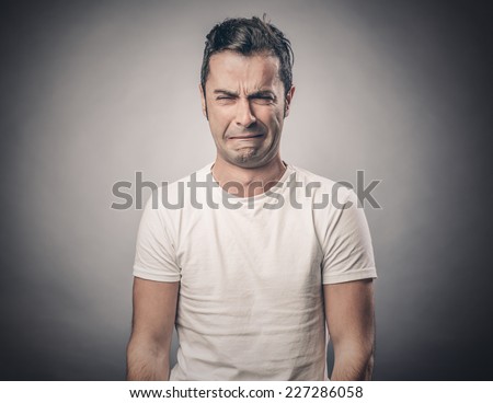 Portrait of disgusted man