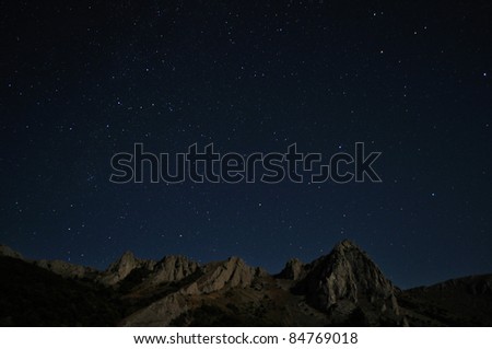Natural rocks and stars at night in the mountains