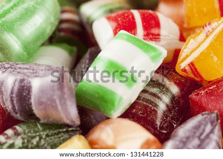 Colorful Sweet Hard Candy Mints against a bright background