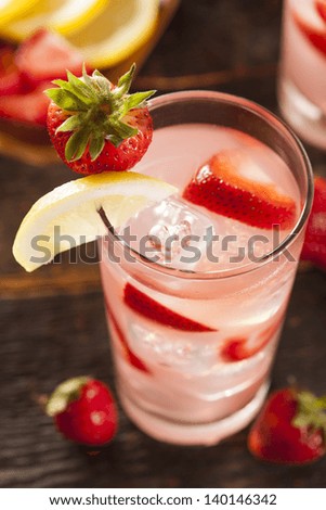 Refreshing Ice Cold Strawberry Lemonade on a background