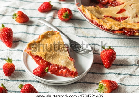 Similar – Image, Stock Photo Strawberry and rhubarb pie with a lattice crust. Fruits dessert