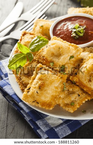 Homemade Fried Ravioli with Marinara Sauce and Basil