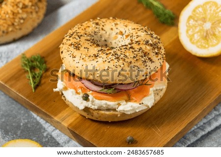 Similar – Image, Stock Photo Delicious salmon bagel on plate in kitchen