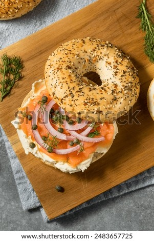 Similar – Image, Stock Photo Delicious salmon bagel on plate in kitchen