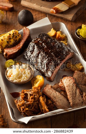 Barbecue Smoked Brisket and Ribs Platter with Pulled Pork and Sides