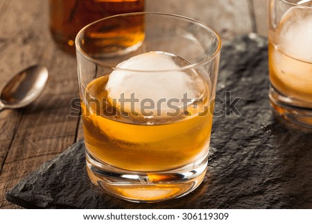 Bourbon Whiskey with a Sphere Ice Cube Ready to Drink