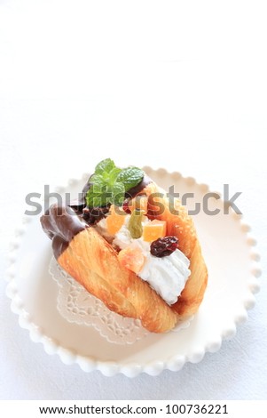 Dried fruit chocolate pie and milk tea for cafe food image