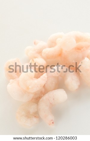 frozen shrimp on white background with copy space
