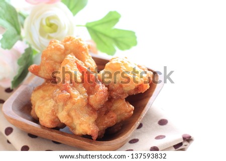 Japanese food, fried chicken on wooden plate with copy space for gourmet food image