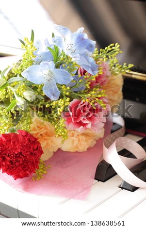 flower bouquet on piano key board