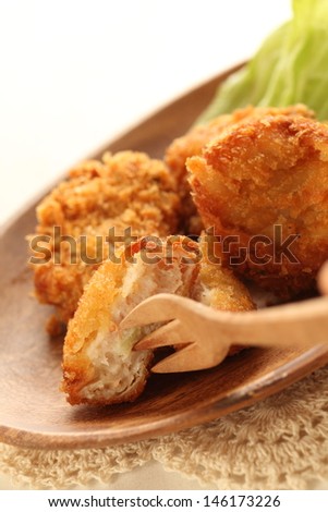 Japanese croquette in half section for gourmet fusion food image