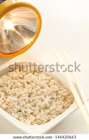 Healthy asian food, barley rice in plastic container for emergency food image