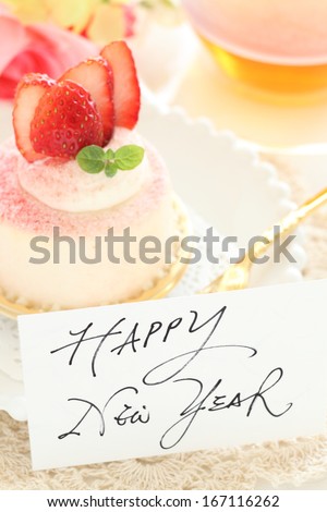 Lovey strawberry mousse cake and tea with New year card for Cafe greeting background image