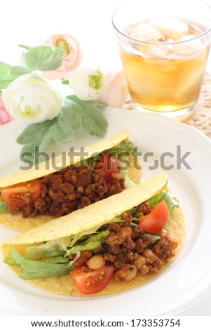 Mexican food, hard shell taco with mince beef and vegetable filling