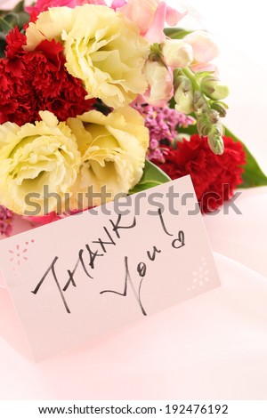 Hand written Thank you card and carnation bouquet for Mother's day image