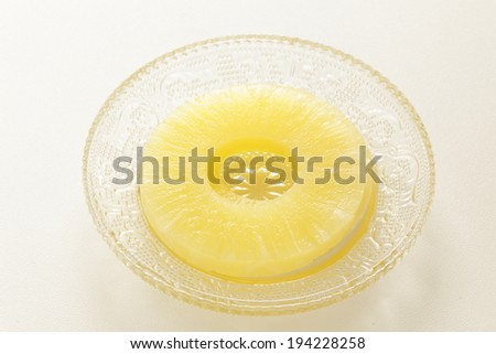 Canned food, pineapple on glass dish for dessert image