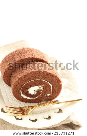 chocolate swiss roll with frozen grape