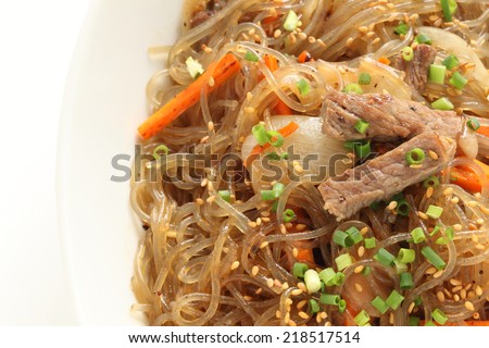 Korean dish known as Japchae made from sweet potato noodles, stir fried in sesame oil with various vegetables