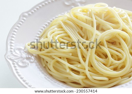 boiled spaghetti on pasta bowl with copy space