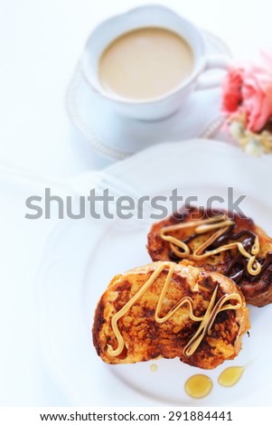 Homemade french toast with peanut butter and honey with milk tea on background,