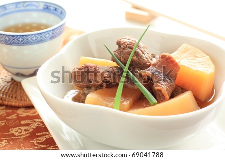 Chinese gourmet , radish and beef muscle stew
