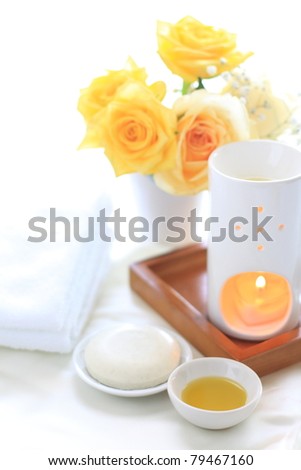 Aroma oil and massage oil with yellow rose for beauty salon image