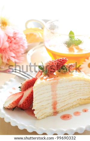 Freshness strawberry and crape cake with english tea for afternoon tea image