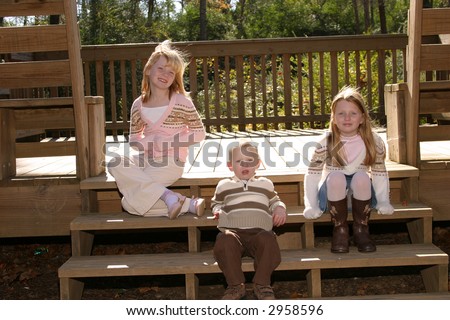 Children sitting on steps