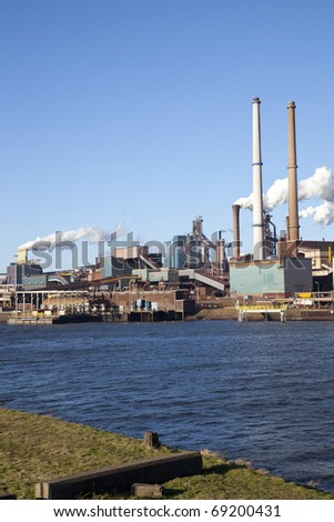 View with heavy industry over water