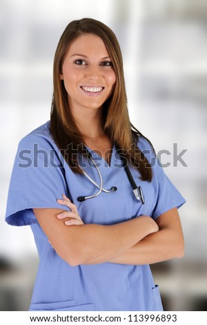 Young Female Nurse Working In A Hospital Stock Photo 113996893 ...