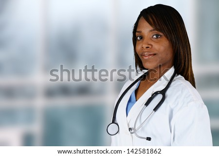 Minority doctor working at her job in a hospital