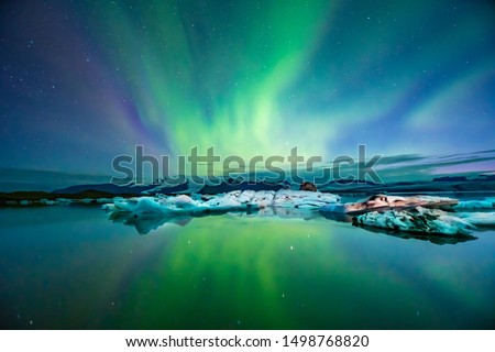 Northern Lights Aurora In Iceland set in the Glacier Lagoon Photo stock © 