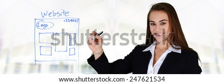 Young woman designing her website