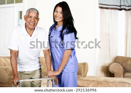 Health care worker helping an elderly man