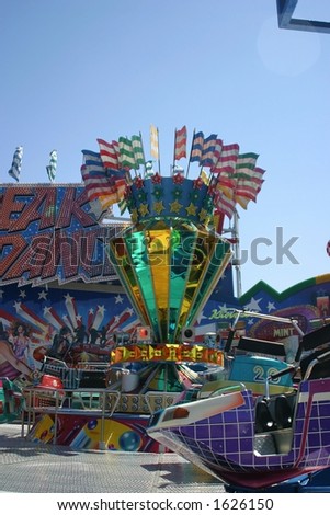 colorful merry go round on a carnival area