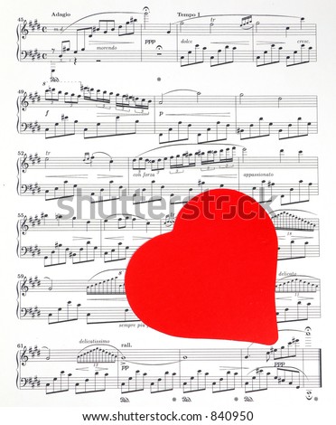 Single red valentine heart over public domain classical sheet music