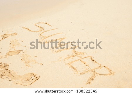 Flat sand and summer letters