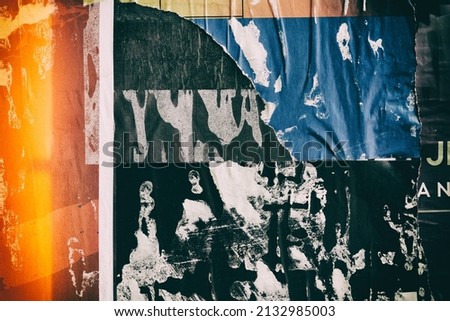 Old ripped torn grunge posters and backgrounds creased crumpled paper backdrop surface placard Foto d'archivio © 