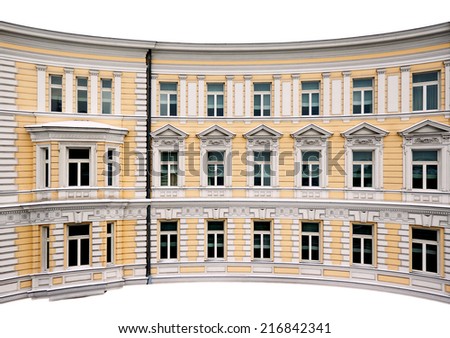 Architecture photo: facade (front) of an old classic typical european urban building with windows, moulding and other decoration isolated on white background.