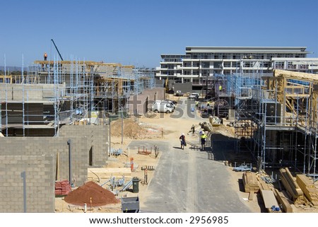 Construction of multilevel residential housing on waterfront property.