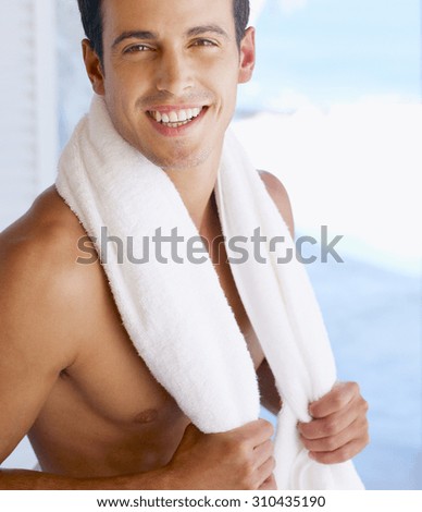 Fresh after a shower and bath man and towel