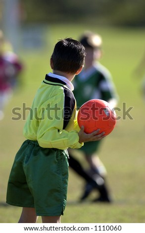 Young Goal Keeper looks to throw ball