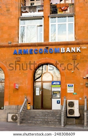 YEREVAN, ARMENIA - JAN 04, 2015: Bank Armeconombank on first floor of old house in Yerevan. ARMECONOMBANK OJSC was first amongst state-owned banks of Armenia to be reorganized into joint-stock bank